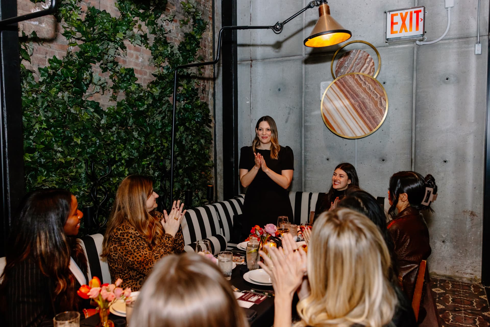Her Workplace members connecting at a private NYC event